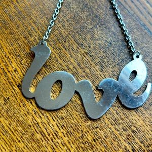 Giant Stainless Steel Love pendant 4 1/2” x 2 1/4”